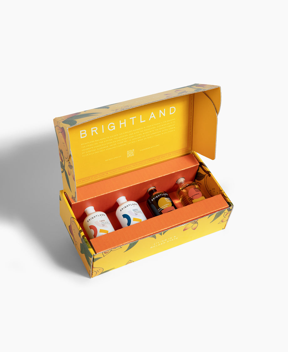 Brightland olive oils and vinegars. The Mini Essentials set in a nice yellow box